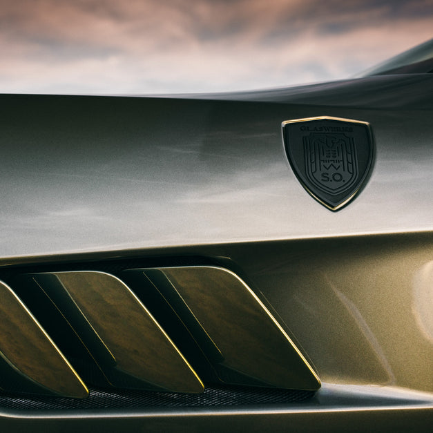 GlasWerks Special Operations Elevato V12 badge on car