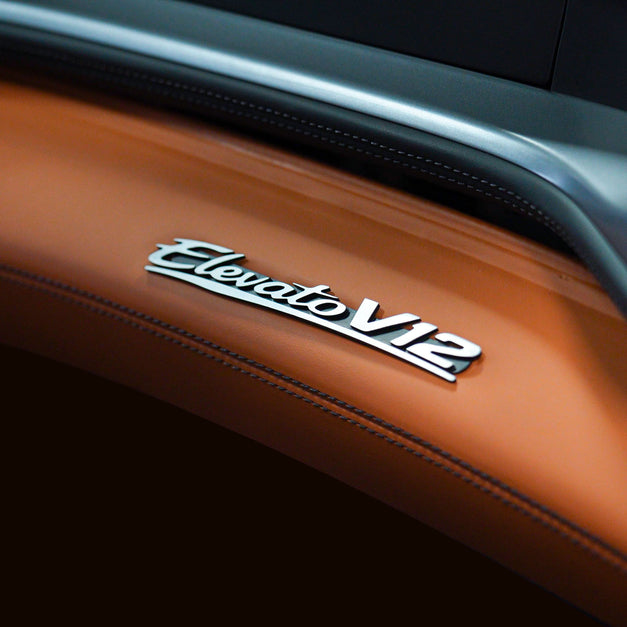 GlasWerks Special Operations Elevato V12 badge on dashboard